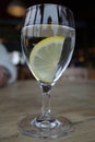 A glass water with a slice of lemon Royalty Free Stock Photo