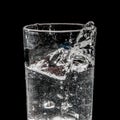 Glass with water splash Royalty Free Stock Photo