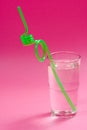 Glass Of Water And Twisted Straw