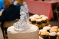 Glass wedding cake topper of a dancing couple