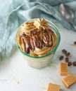 Glass of whipped coffee and caramel mousse cream Royalty Free Stock Photo