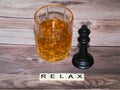 Glass of Whiskey, Cigar and Chess Piece King Royalty Free Stock Photo