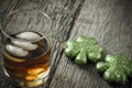 Glass of Whiskey and Clovers Royalty Free Stock Photo