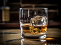 Glass of whiskey with ice cubes on the rock table, generative ai Royalty Free Stock Photo