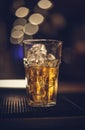 Glass of whiskey on the ice rocks Royalty Free Stock Photo