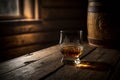 Glass of whiskey with ice. Still life. Brandy, bourbon on a brown wooden table, rustic style, alcohol drink. Rum, scotch. Image is Royalty Free Stock Photo