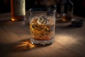 Glass of whiskey with ice. Still life. Brandy, bourbon on a brown wooden table. Strong alcohol drink close-up. Rum, scotch. Image