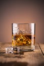 Glass of whiskey with ice Royalty Free Stock Photo
