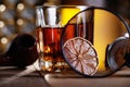 Glass of whiskey, magnifying glass, lemon and smooking pipe Royalty Free Stock Photo