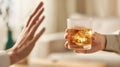 The glass of whiskey offered to the person refusing the drink. AI generated image Royalty Free Stock Photo