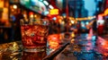 a glass of whiskey stands elegantly on a wooden table Royalty Free Stock Photo