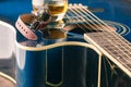 Glass of whiskey on the table and guitar Royalty Free Stock Photo