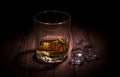A glass of whisky in the dark