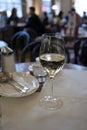 Glass of white dry Austrian wine served in cafe in Vienna, Austria