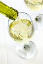 Glass of White Wine Being Poured Royalty Free Stock Photo