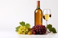 Glass of white wine, bottle and grapes on white background with copy space Royalty Free Stock Photo