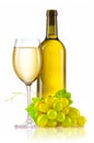 Glass of white wine with bottle and ripe grapes isolated Royalty Free Stock Photo