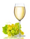Glass of white wine and a bunch of ripe grapes isolated Royalty Free Stock Photo