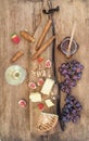 Glass of white wine, cheese board, grapes, figs, strawberries, honey and bread sticks on rustic wooden background Royalty Free Stock Photo