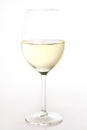 A glass of white wine isolated over background Royalty Free Stock Photo