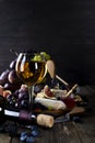 Glass of white wine on picnic table. Royalty Free Stock Photo