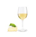 Glass of white wine and a slice of Camembert cheese Royalty Free Stock Photo