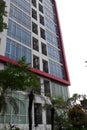 Glass Window Facade and red line accent of a modern apartment building Royalty Free Stock Photo