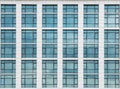 The glass window pattern on the building wall with the cloud reflection Royalty Free Stock Photo