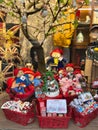 Glass window in a store showcases festive Christmas decorations and gifts at York