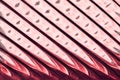 Glass window with strips in a hue of red and pink color, strip format abstract glass texture as background Royalty Free Stock Photo