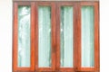Glass windows with wooden frame on white wall Royalty Free Stock Photo