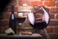 Glass of wine against a brick wall Royalty Free Stock Photo