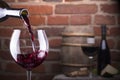 Glass of wine against a brick wall Royalty Free Stock Photo