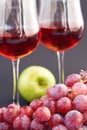 A glass of wine, apple and grape Royalty Free Stock Photo