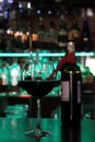 Glass of wine on the bar in the evening Royalty Free Stock Photo