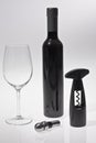 Glass & Wine Bottle with corkscrew Royalty Free Stock Photo