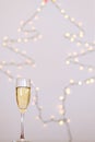 A glass of wine, champagne with envelope against bokeh background close up. Top view. New Year, Christmas mood. Greeting card Royalty Free Stock Photo