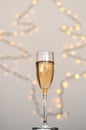 A glass of wine, champagne with envelope against bokeh background close up. Top view. New Year, Christmas mood. Greeting card Royalty Free Stock Photo