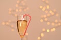 A glass of wine, champagne with envelope against bokeh background close up. Top view. New Year, Christmas mood. Greeting card Royalty Free Stock Photo