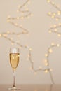 A glass of wine, champagne with envelope against bokeh background close up. Top view. New Year, Christmas mood. Greeting card Royalty Free Stock Photo