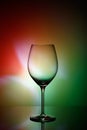 Glass of wine on a colored background Royalty Free Stock Photo