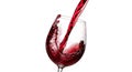 Glass wine cup with red wine spilling and swirling inside, with liquid splash motion Royalty Free Stock Photo