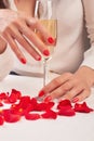 Glass of wine in female hands. Royalty Free Stock Photo