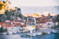 Glass of wine with Omis Riviera view, relax seascape background, Croatia