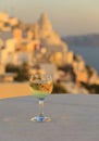 Glass of wine at sunset in Santorini Royalty Free Stock Photo