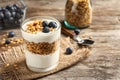 Glass with yogurt, berries and granola