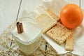 A glass of yogurt, pastry and fresh fruits on a light surface Royalty Free Stock Photo