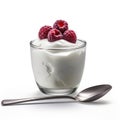 a glass of yogurt with raspberries