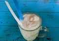 a glass of young coconut ice that refreshes and restores energy