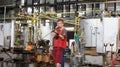 Glassblower shaping a vase Royalty Free Stock Photo
